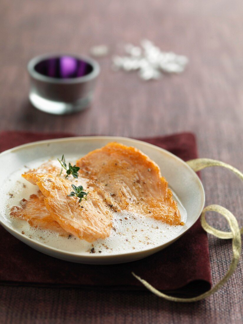 Salmon escalope with a foamy Champagne Nage