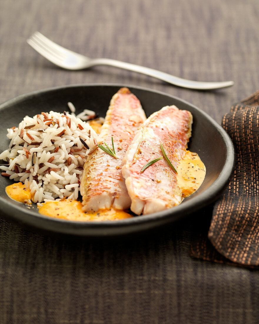 Red mullet fillets with creamy pepper sauce and rice