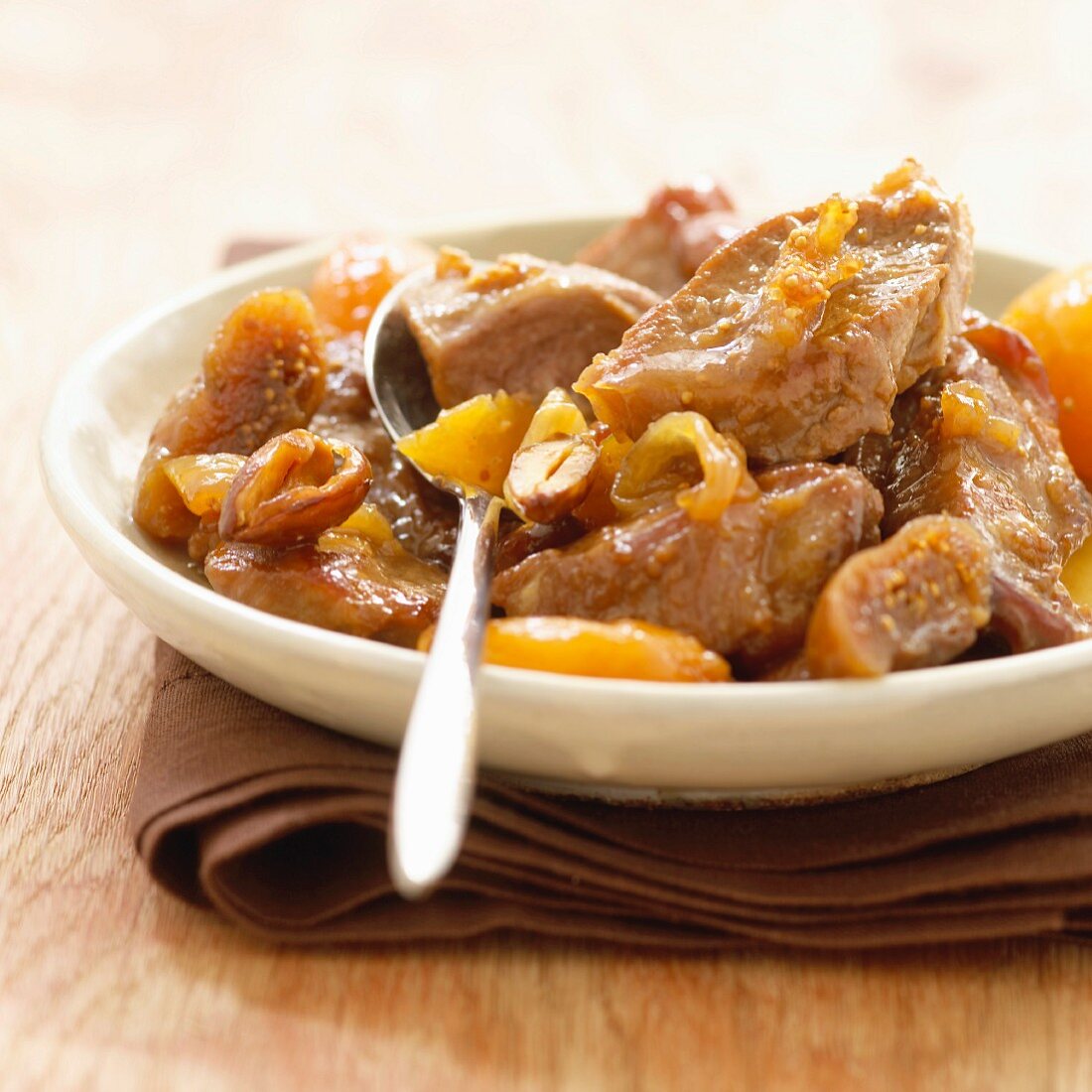 Bourbonnais lamb stew with dried fruit and onions