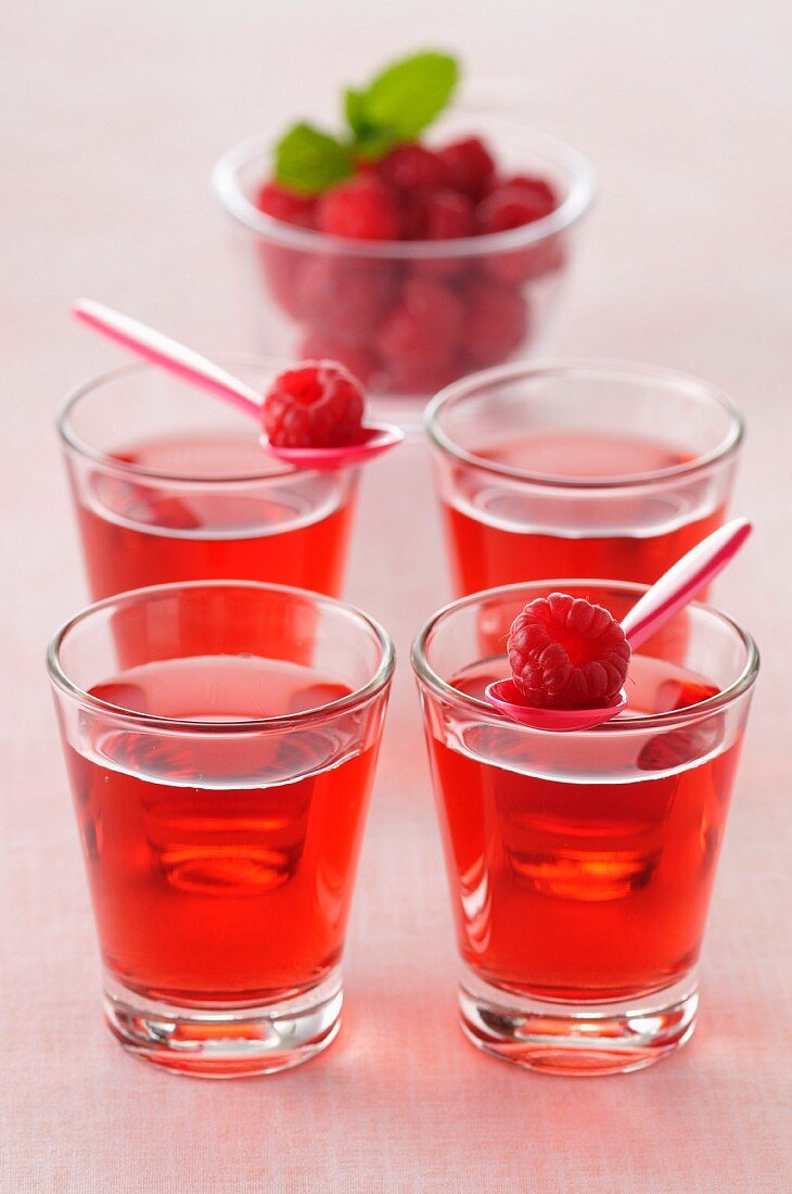 Glasses of raspberry cordial