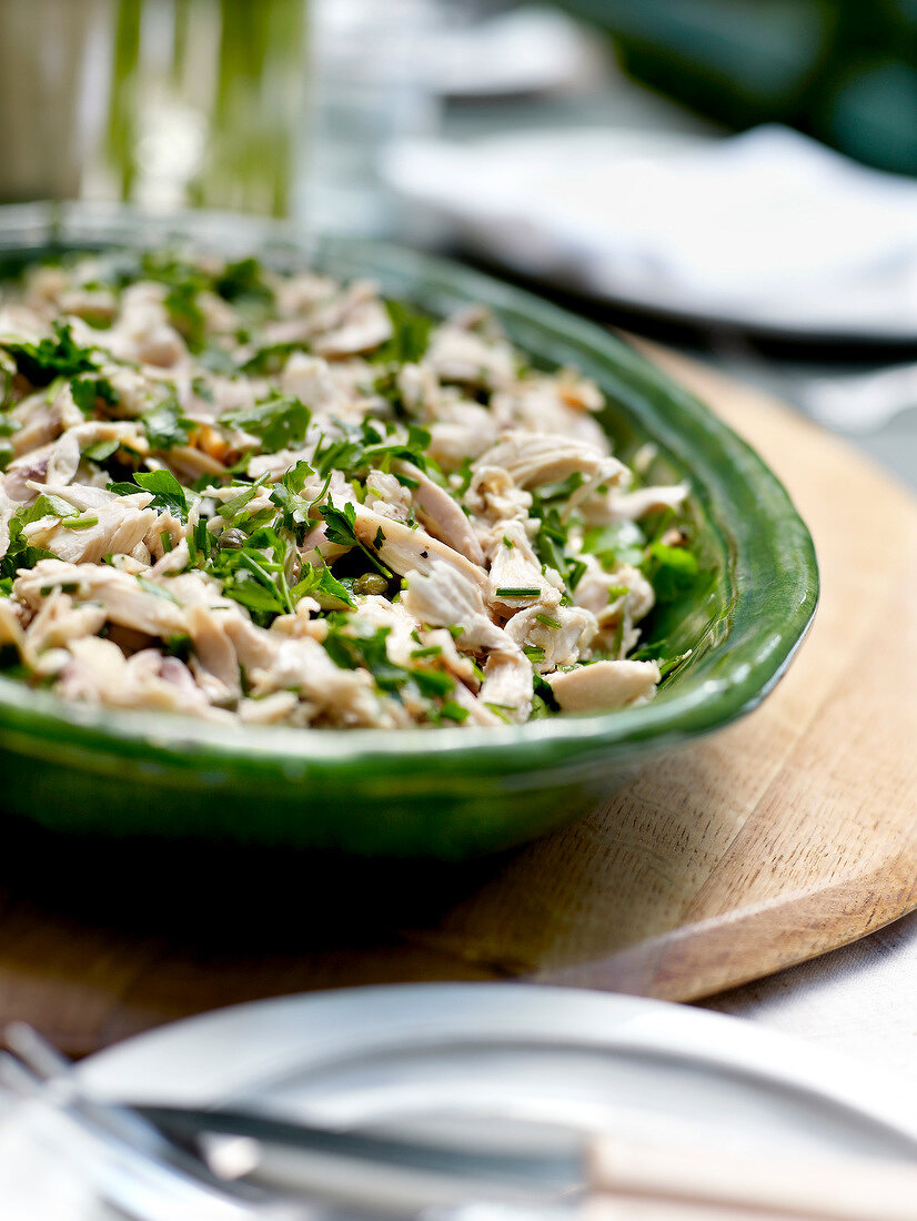 Flaked chicken and herb salad