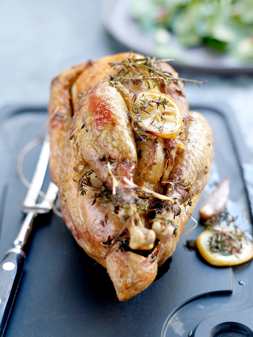 Roast guinea-fowl with lemon and herbs