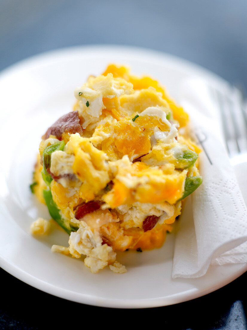 Scrambled eggs with peppers and ham