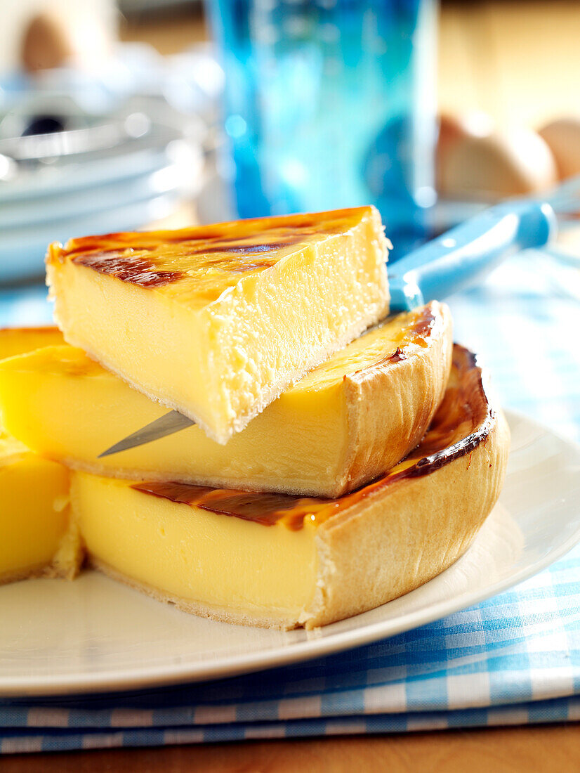 Portions of baked egg custard tart