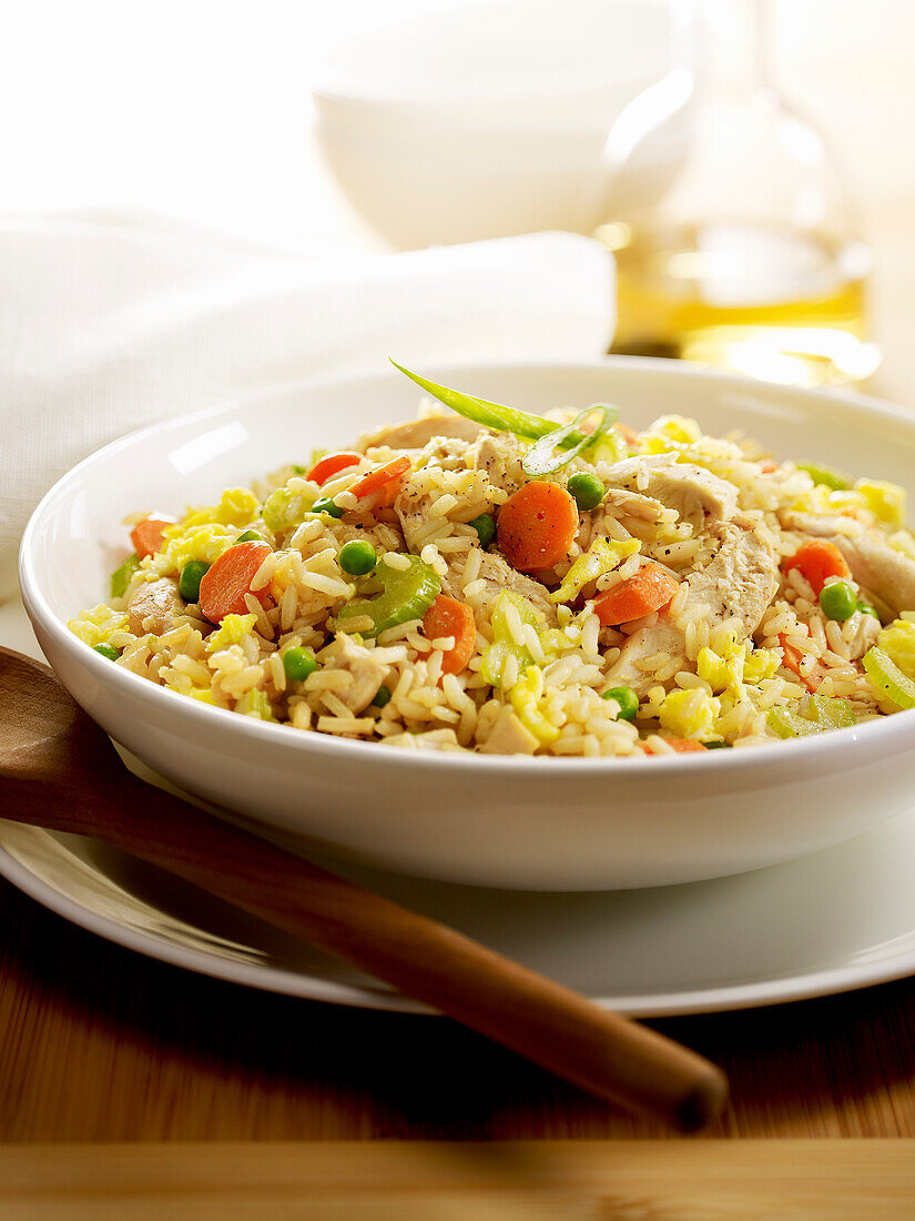 Rice with chicken ,peas and carrots
