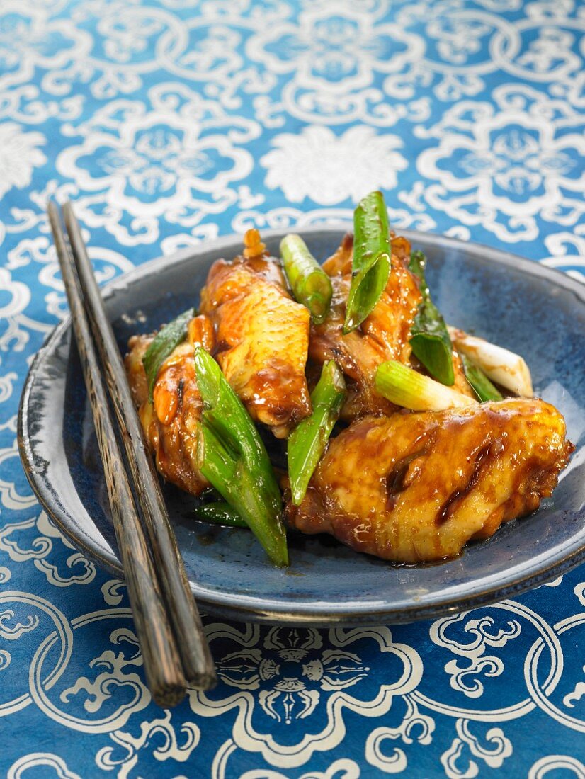 Chicken wing with onion, ginger and coca-cola sauce