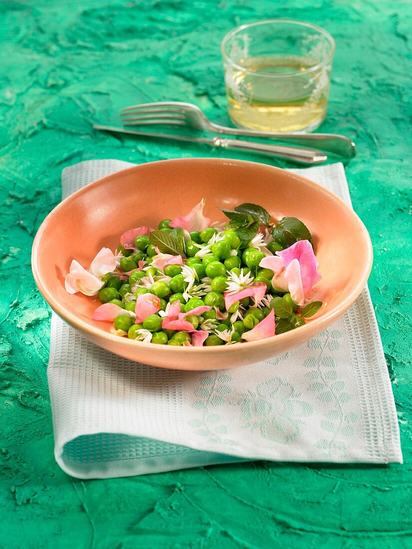 Peas with flowers and mint