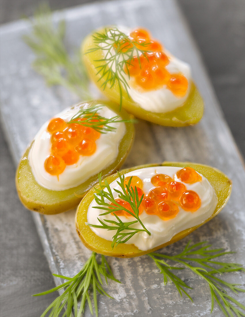 Ratte potatoes with cream and salmon roe