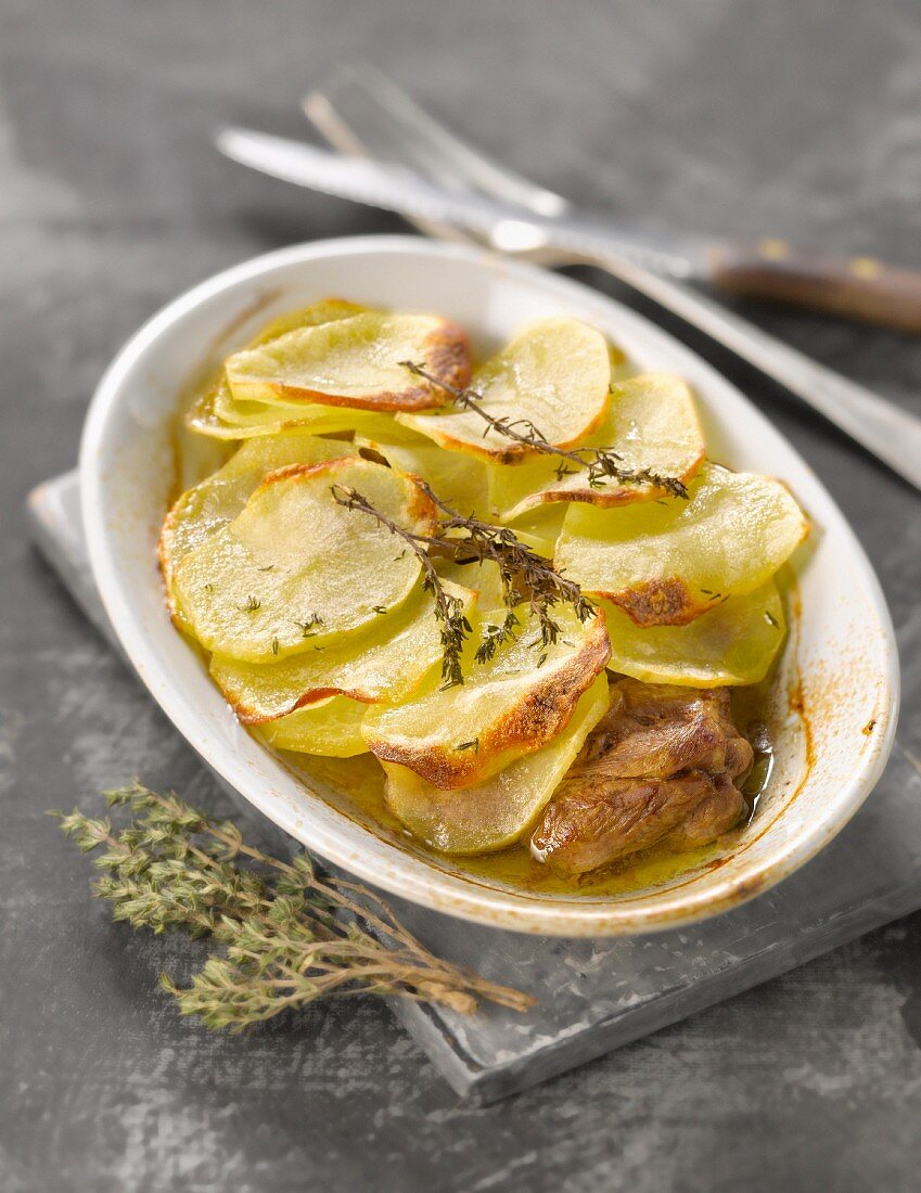 Sauteed potatoes with lamb and thyme