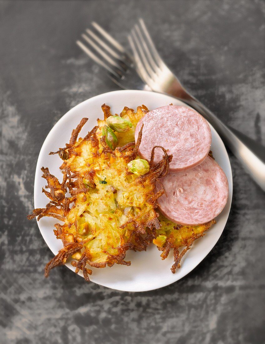 Rösti hash browns with pistachio and saucisson from Lyon