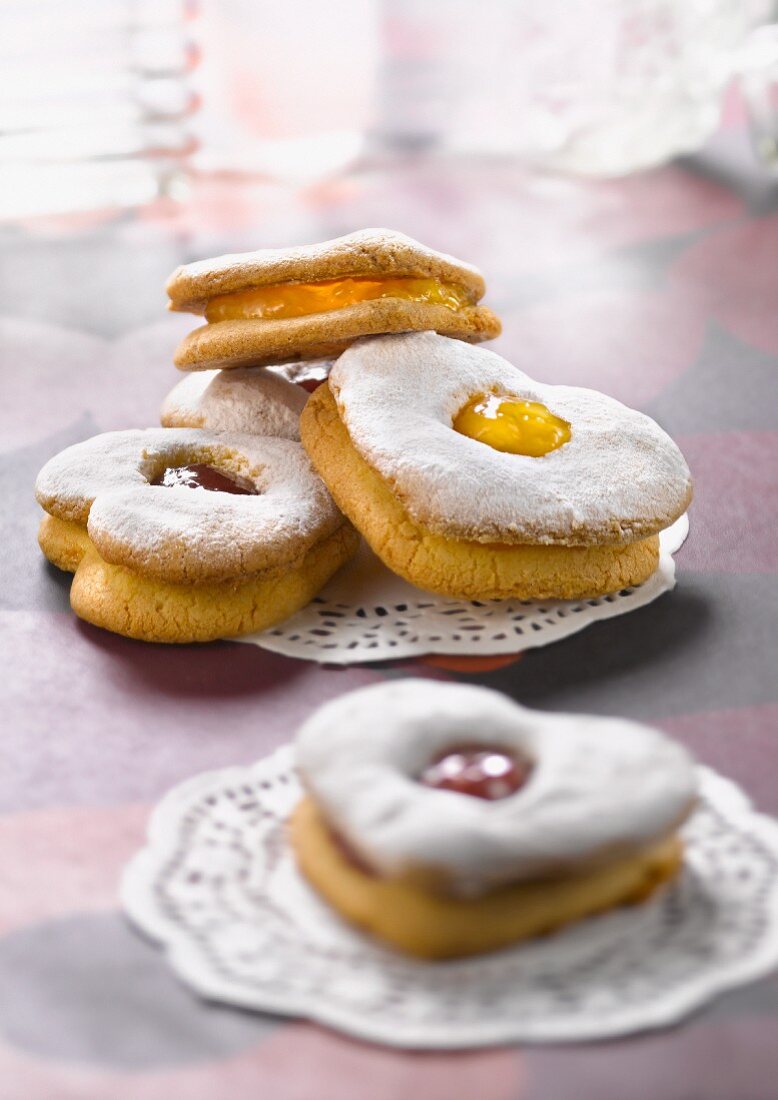 Cookies with raspberry and peach jam filling