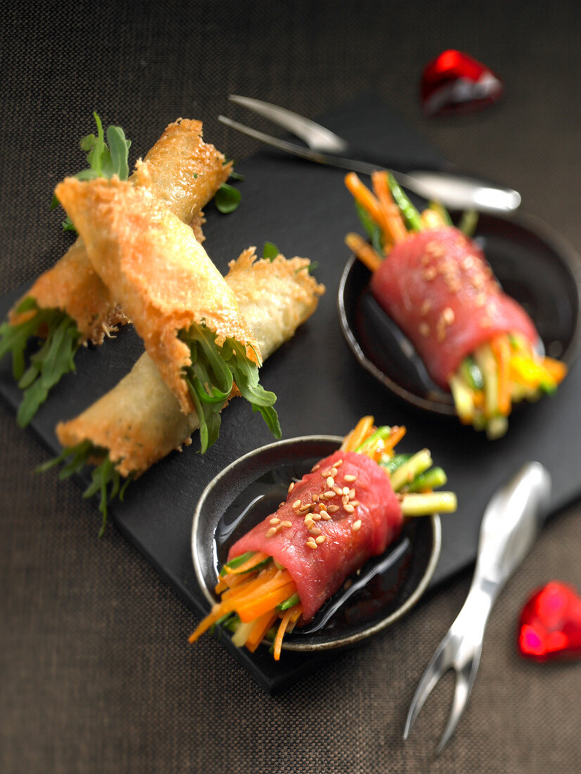 Parmesan and rocket rolls,carpaccio and vegetable appetizers