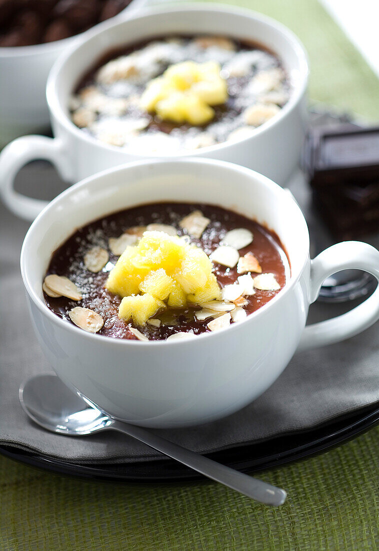 Chocolate cream dessert with almonds,pineapple and coconut