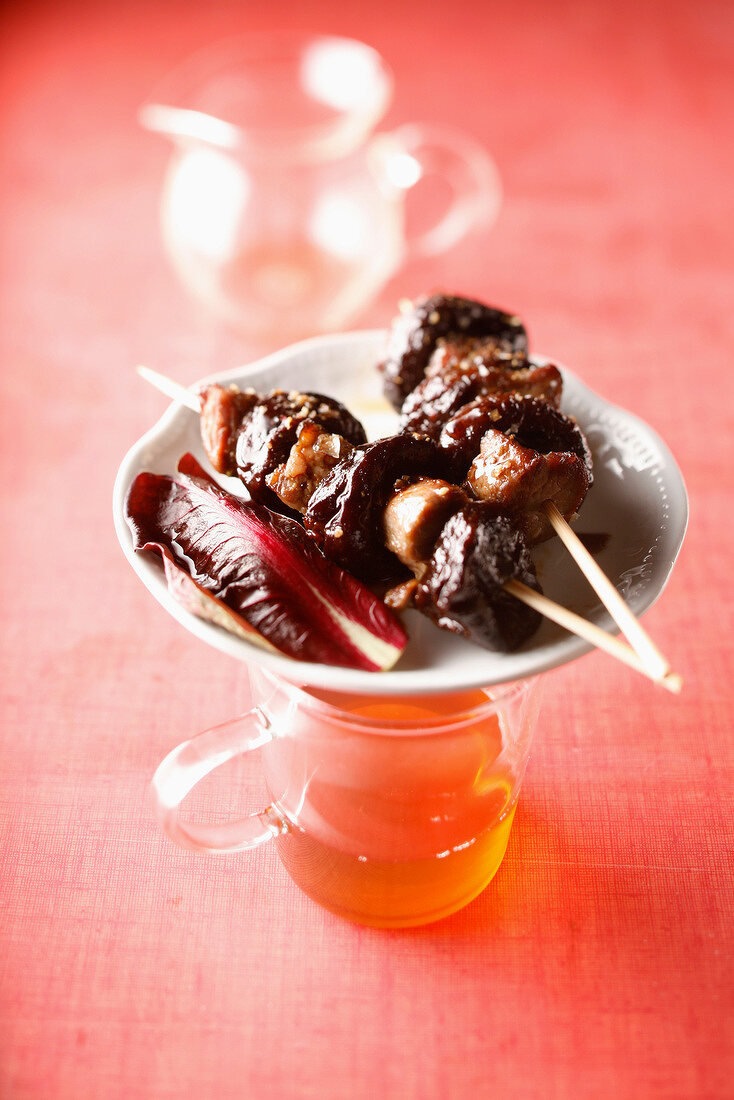 Lamb and prune brochettes