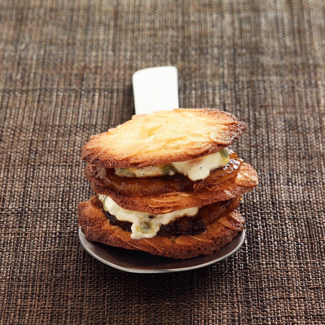 Almond tuile biscuit , roast pineapple and passion fruit whipped-cream Mille-feuille