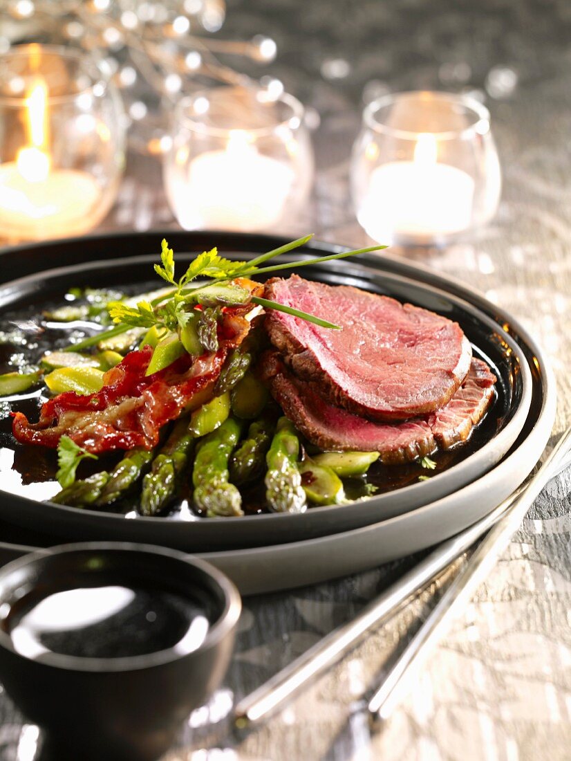 Sweet and sour beef fillet with green asparagus