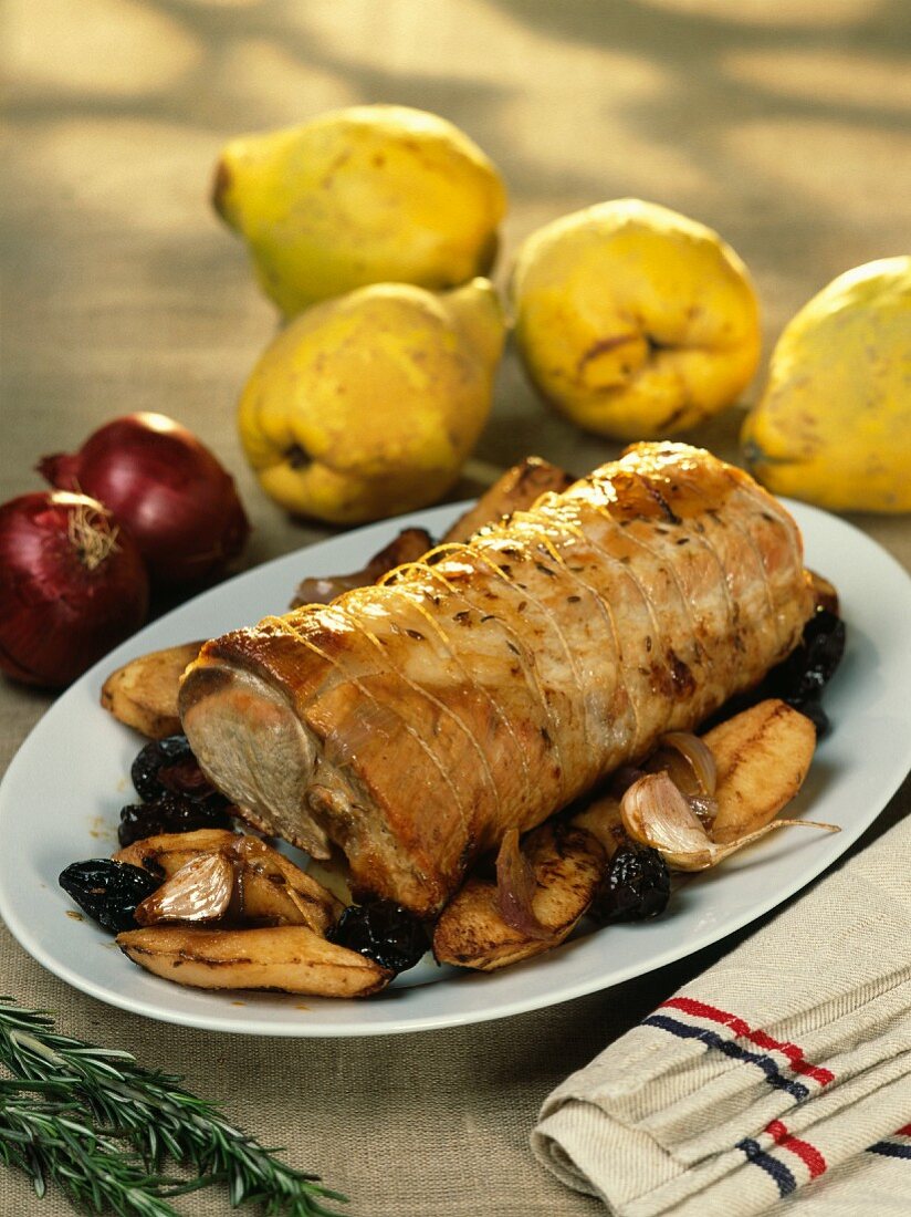 Roast pork with quince and prunes