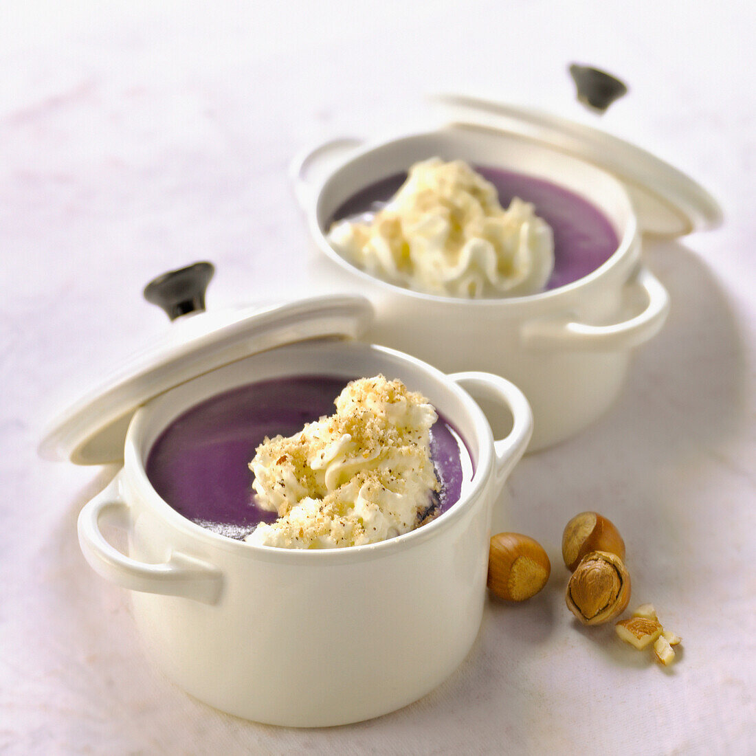 Vitelotte soup with hazelnut whipped cream