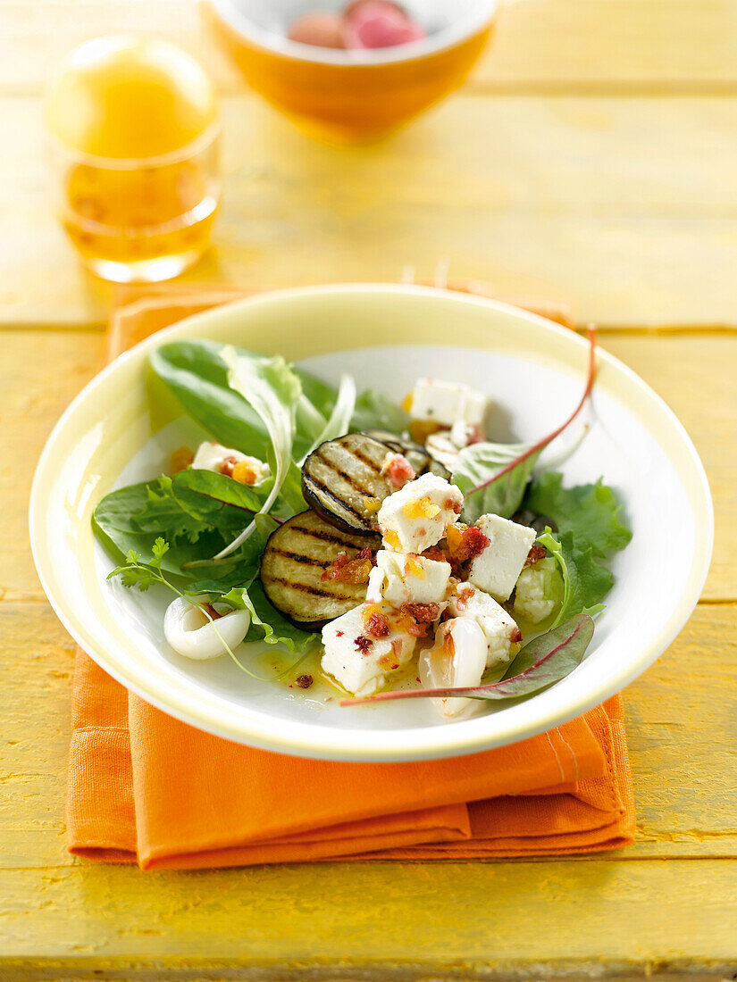 Mixed salad with grilled eggplants,lychees and feta