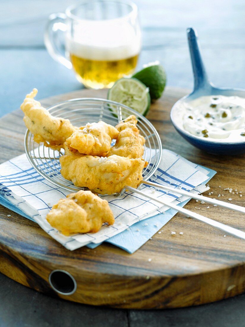 Fish and beer fritters ,yoghurt sauce,capers and lime