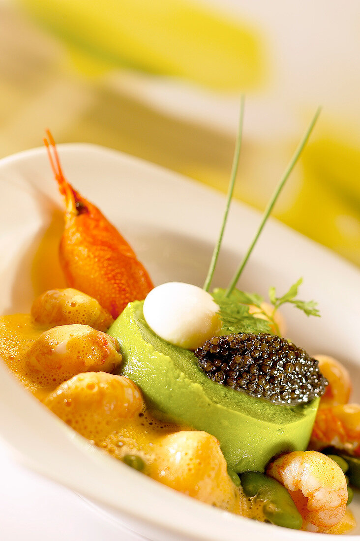 Pea flan with caviar and crayfish