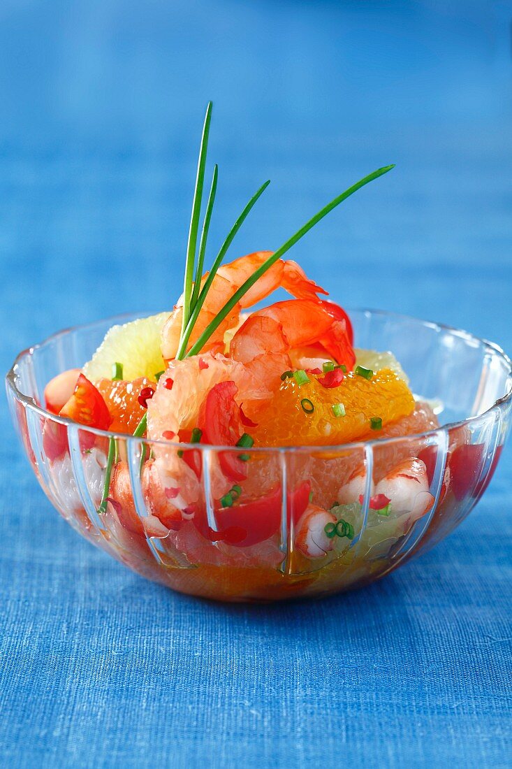 Citrus fruit and gambas salad with pink peppercorns