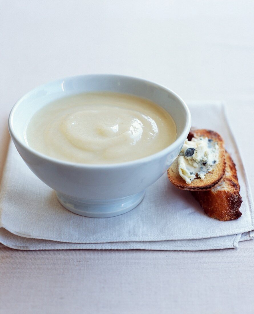 Cream of cauliflower soup with roquefort on toast