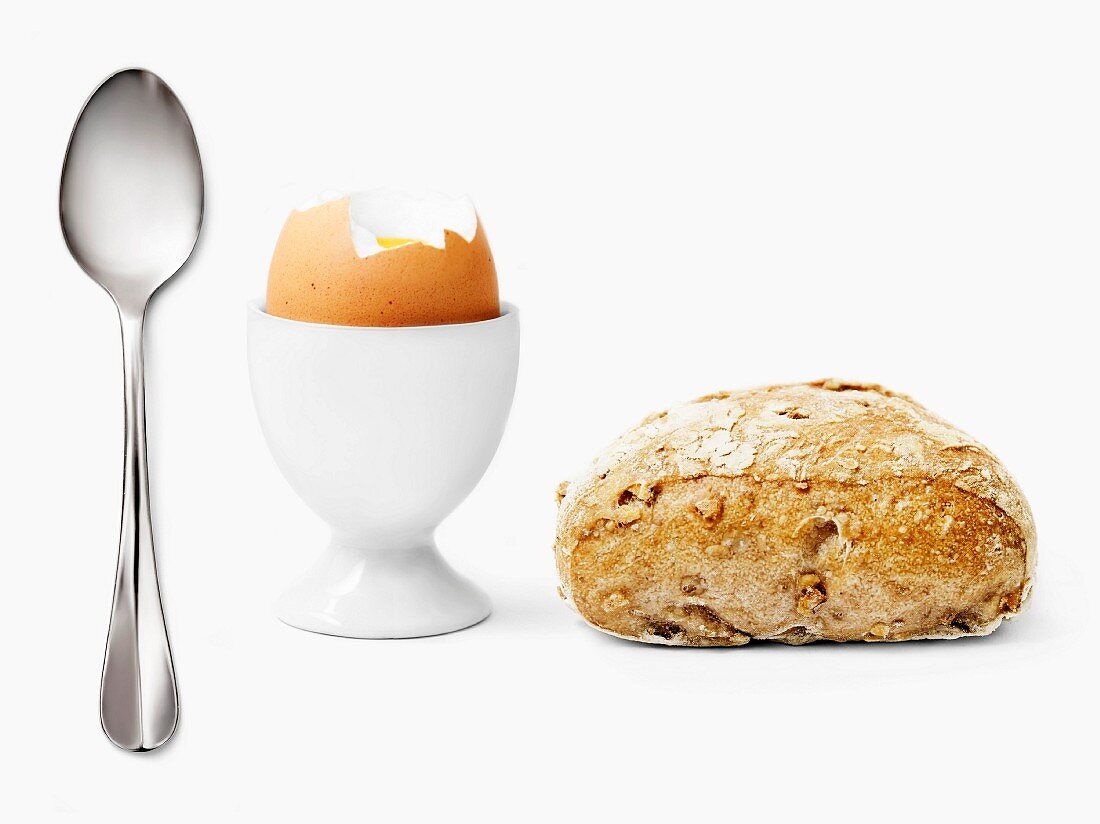 Spoon,bread and soft-boiled egg