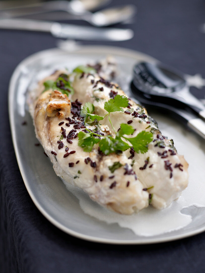 Monkfish with coconut milk and black rice