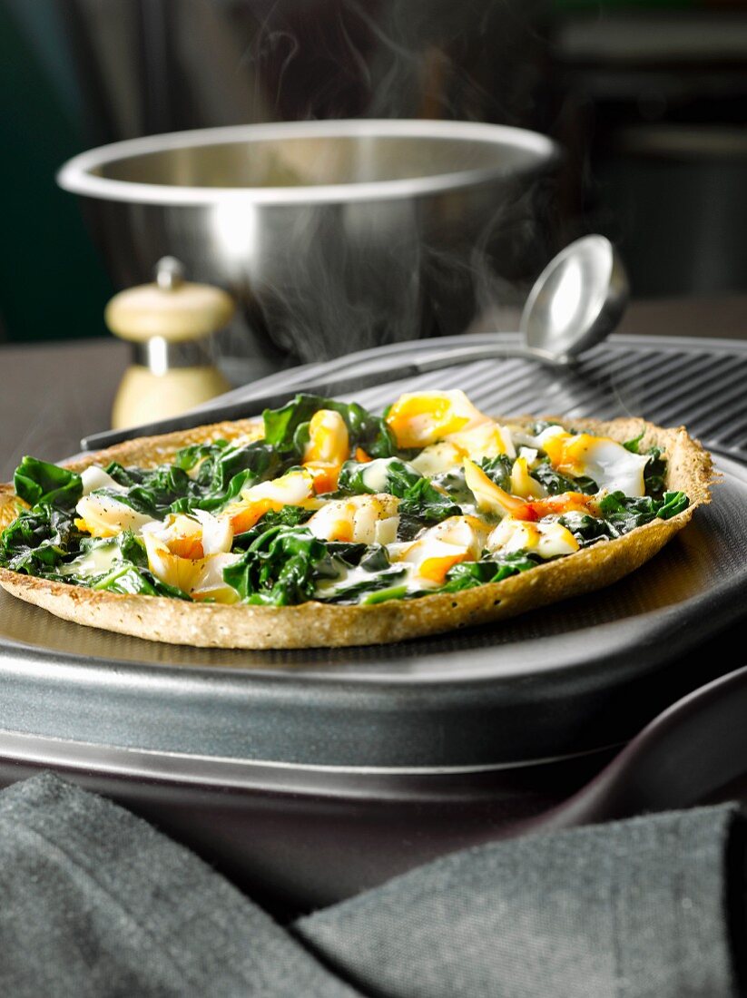 Buckwheat pancake with haddock and spinach