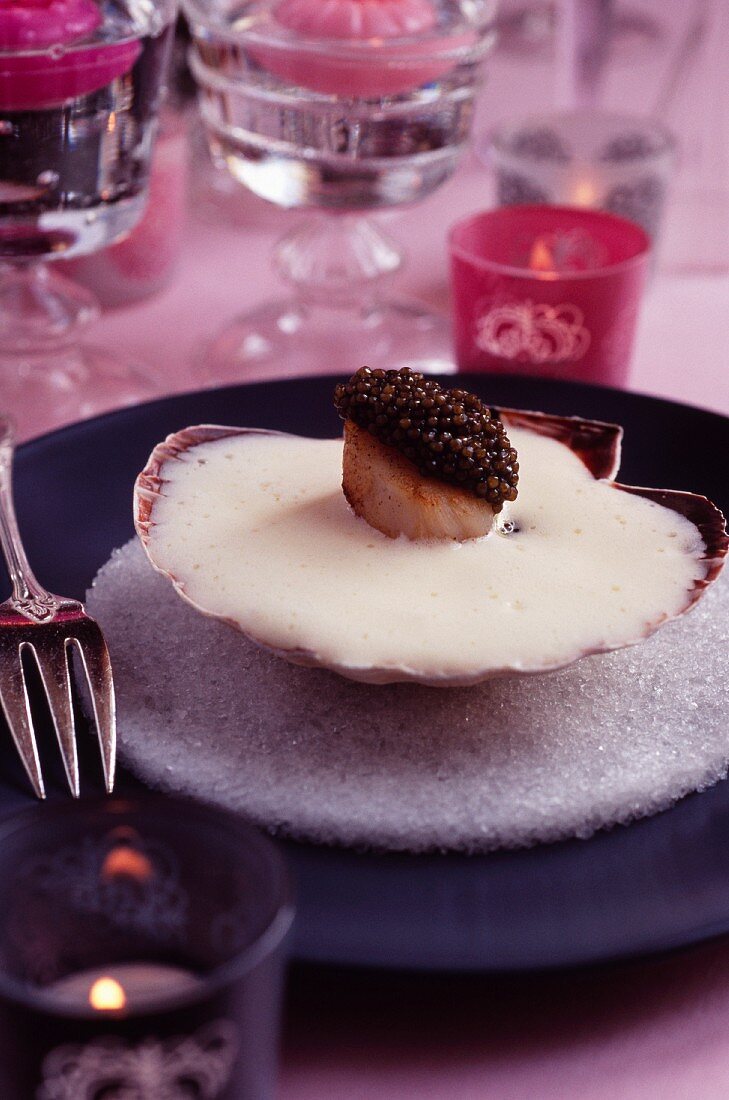 Roast scallop with caviar with moussy Zabaglione