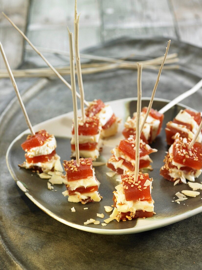 Quince paste, cream cheese and sesame seed appetizers