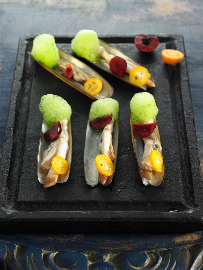 Razor clams with prunes, kumquats and fresh herb mousse