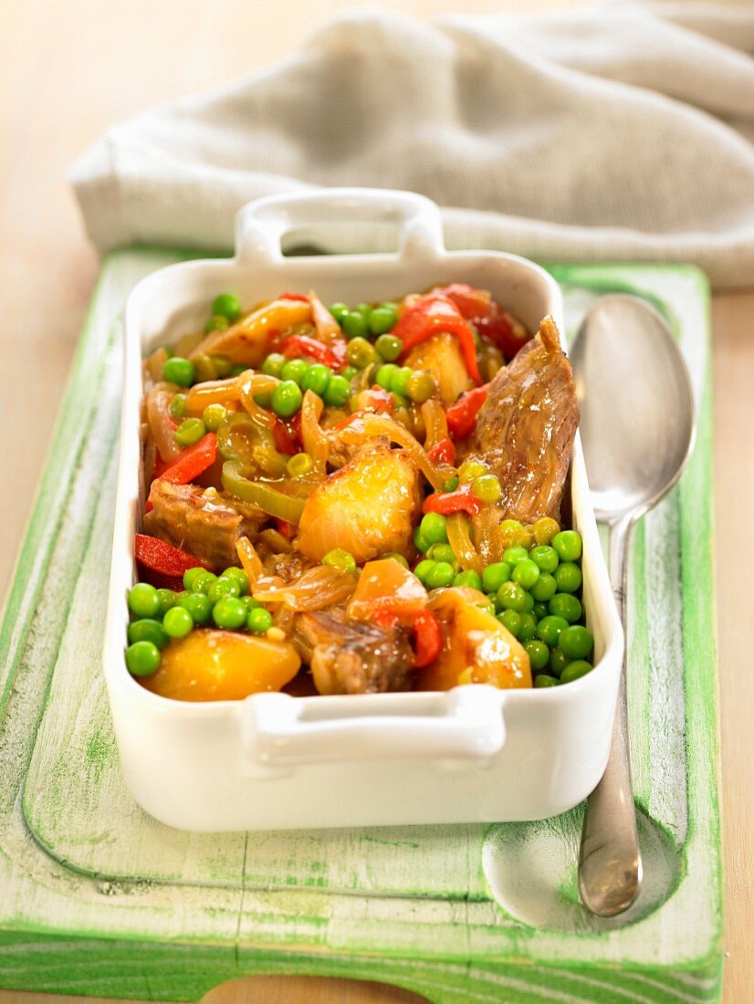 Meat with peas and onions