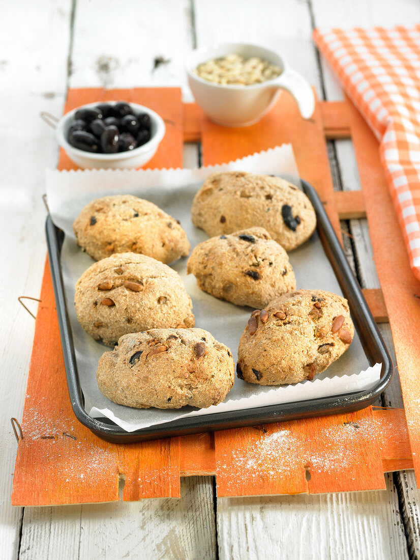 Pine nut and olive small wholemeal breads