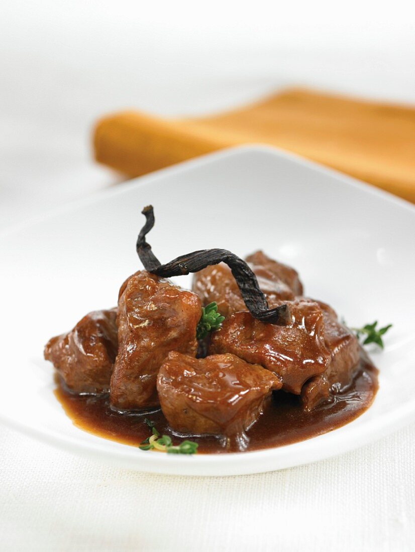 Spanish pork cooked in red wine with vanilla