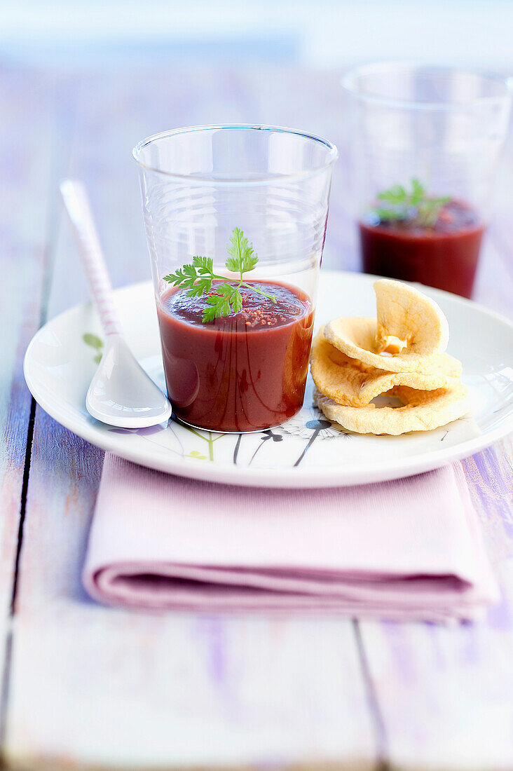Cream of beetroot soup with sliced Granny Smith apple