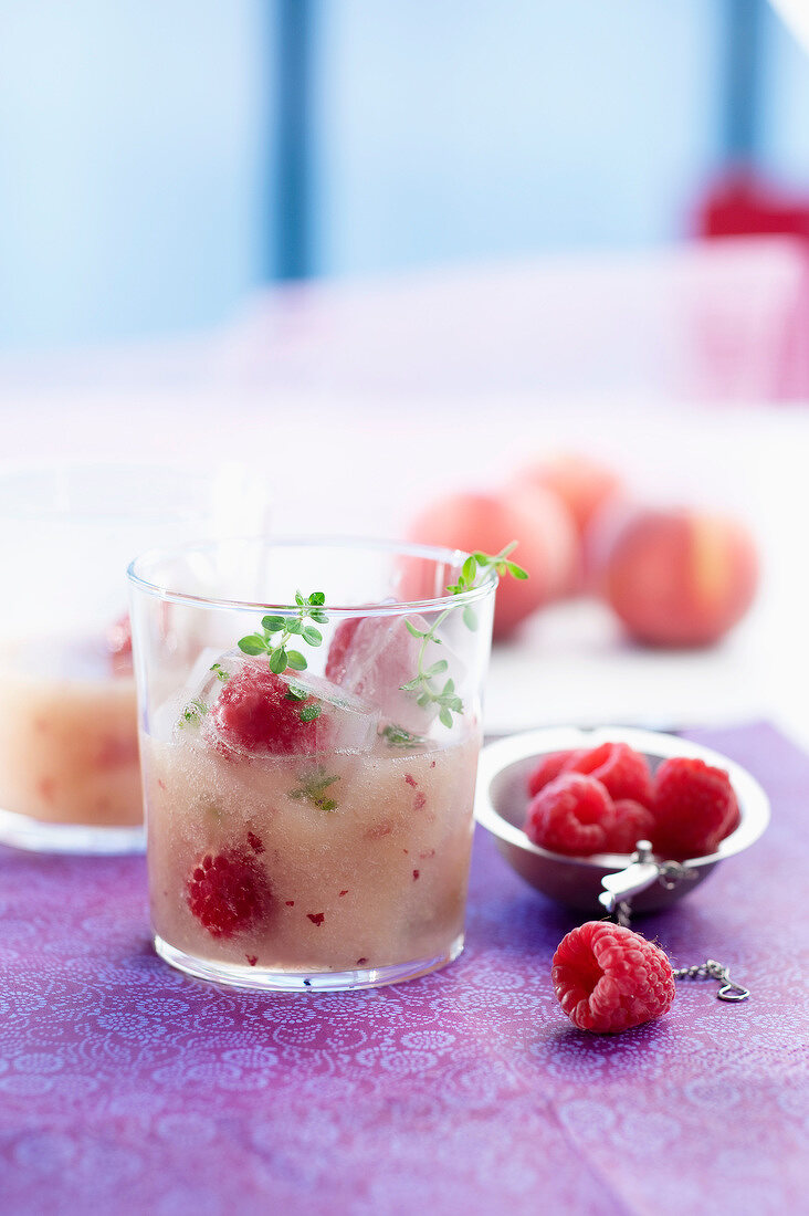 Peach and raspberry soup with thyme infusion
