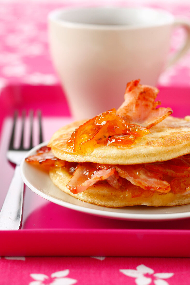 Pancakes with orange marmelade and grilled streaky bacon