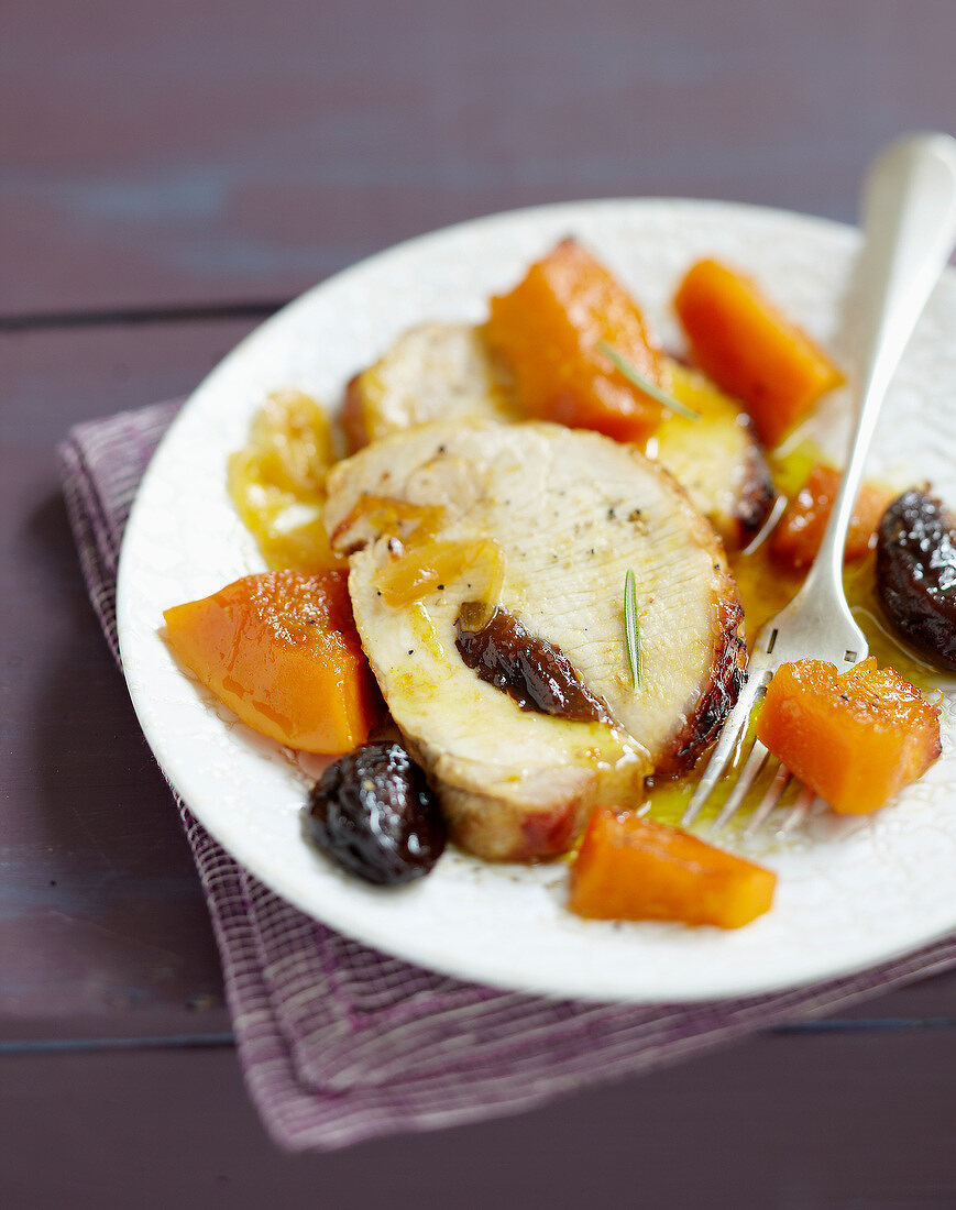 Roast pork with prunes and stewed pumpkin