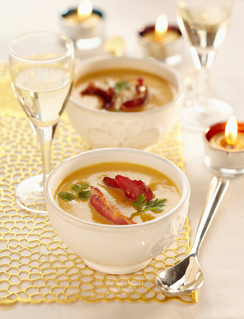 Cream of pumpkin soup with duck breast crisps