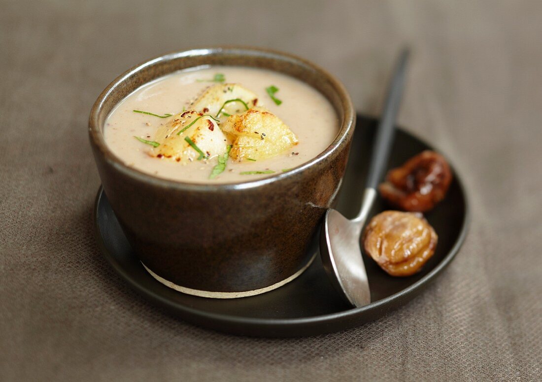 Cream of chestnut soup with roast scallops