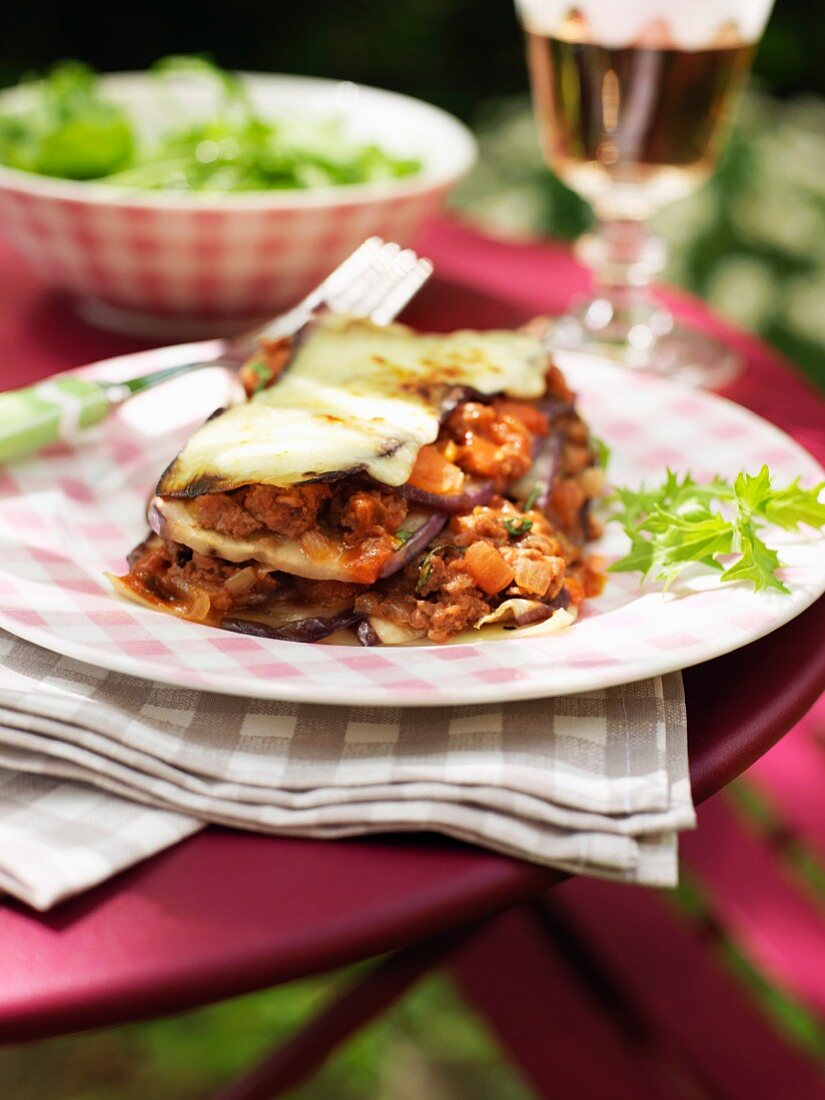 Vegetable lasagnes on a table outdoors