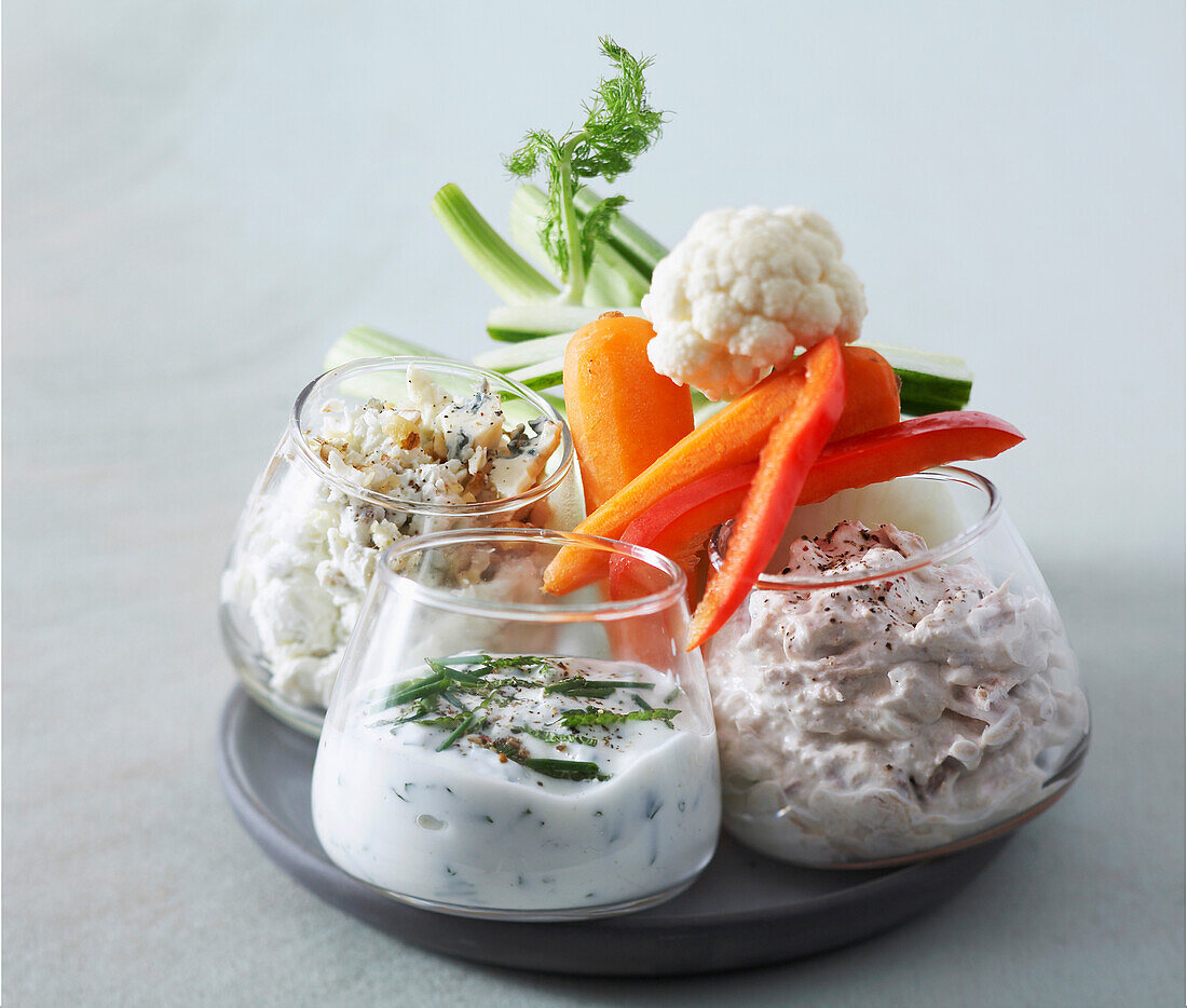 Raw vegetables and three dips
