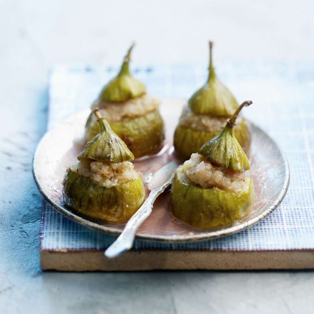 Figs with cream stuffing cooked in a Tajine
