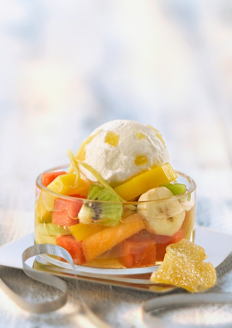 Exotic fruit salad with Champagne, crystallized ginger yoghurt ice cream