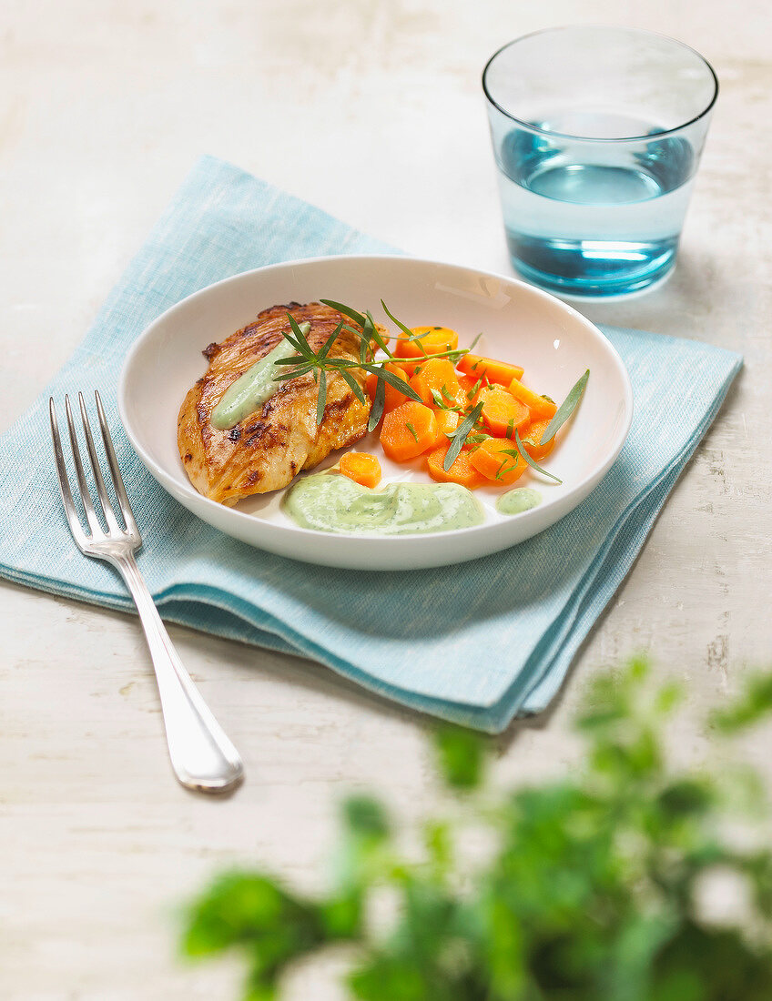 Grilled chicken breast, steamed carrots and tarragon sauce