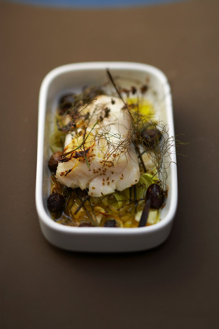 Thick piece of cod with herbs and lemon
