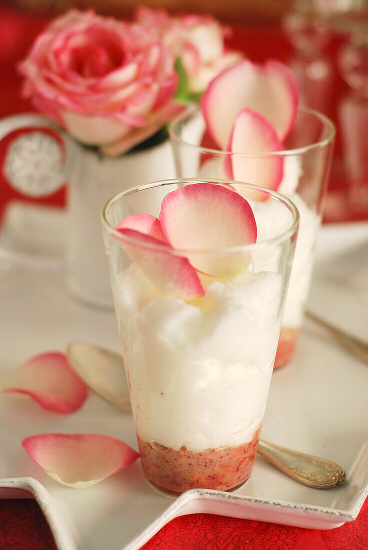 White chocolate and wild strawberry cappuccino with rose petals