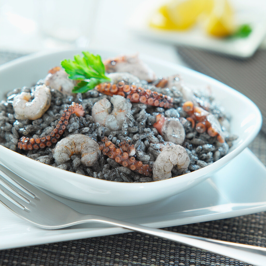 Black rice with octopus and shrimps